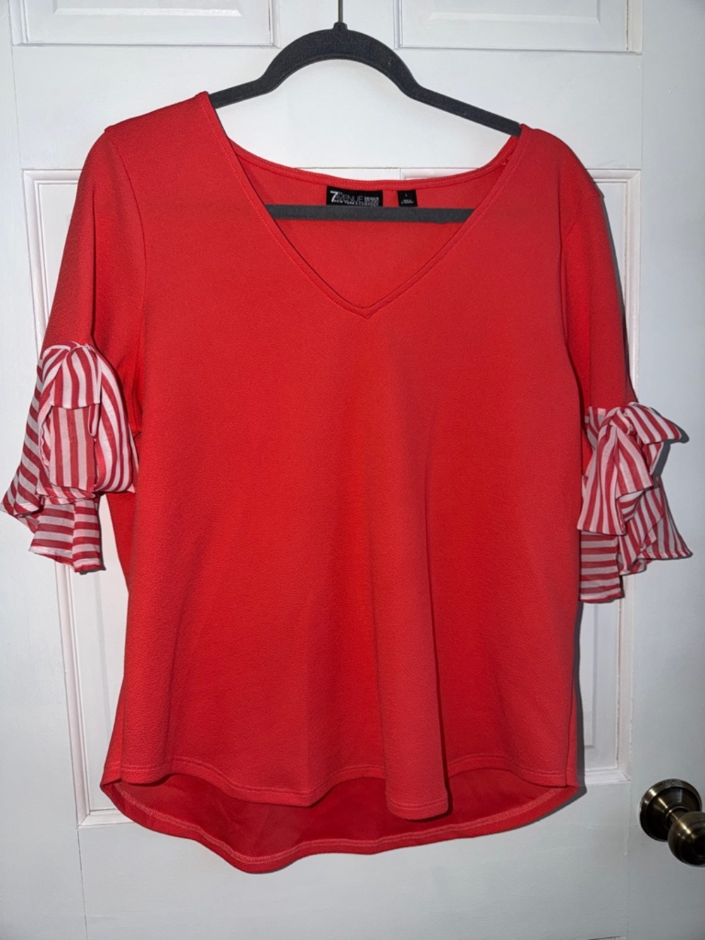 NEW YORK AND COMPANY  Coral Red V-Neck Top with Striped Ruffle Sleeves